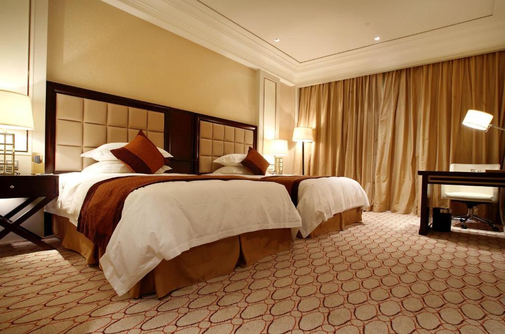 Landison Green Town Hotel Xinchang Habitación foto
