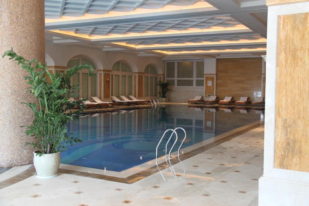 Landison Green Town Hotel Xinchang Exterior foto