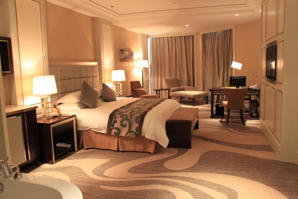 Landison Green Town Hotel Xinchang Habitación foto