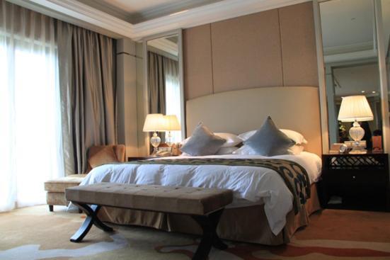 Landison Green Town Hotel Xinchang Habitación foto